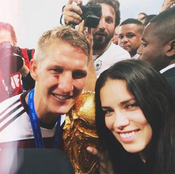 Adriana Lima with the injured Bastian Schweinsteiger at the World Cup 2014 final. 