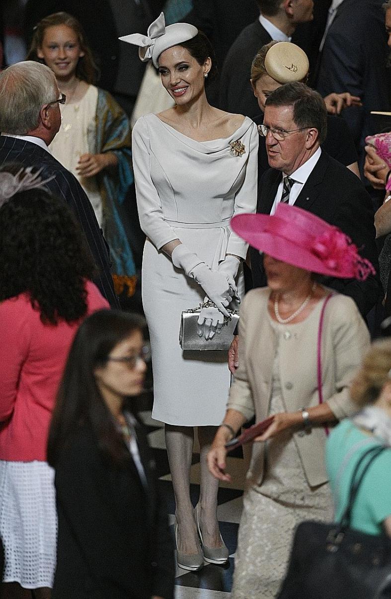 Hollywood royalty Angelina Jolie does British royalty - and reigns