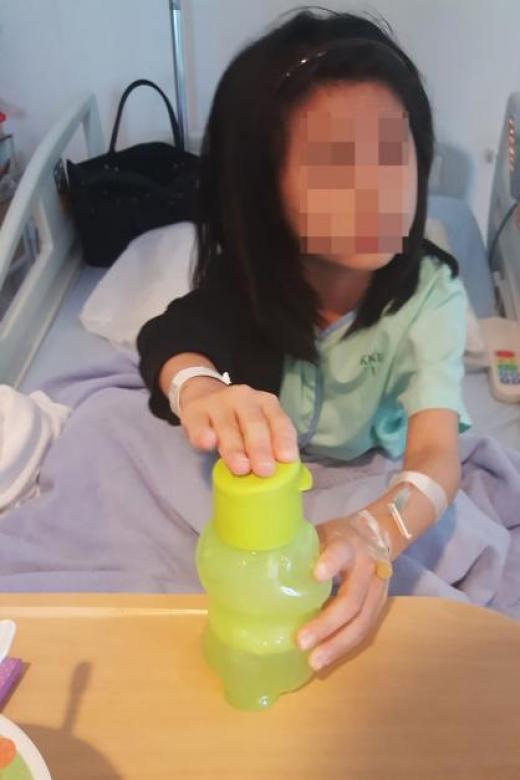 Girl in hospital after drinking from soap-laced water bottle