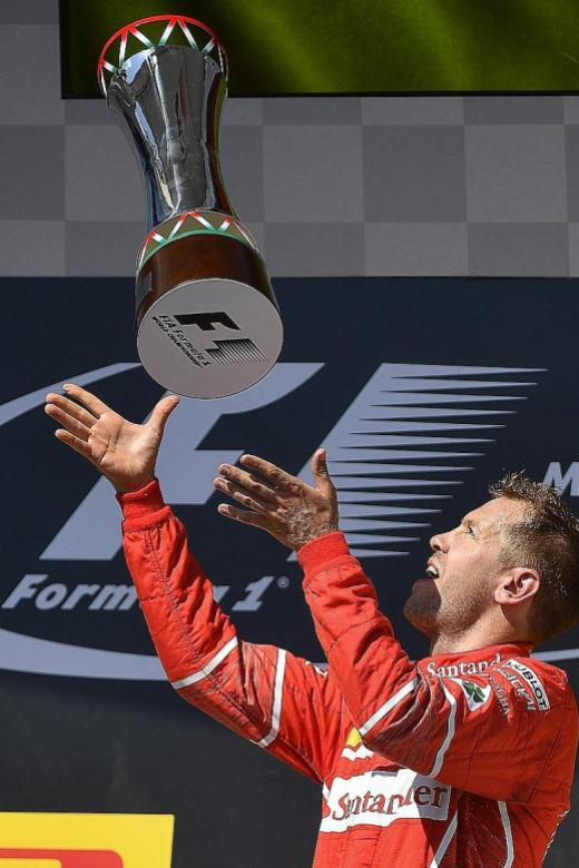 Vettel back to winning ways