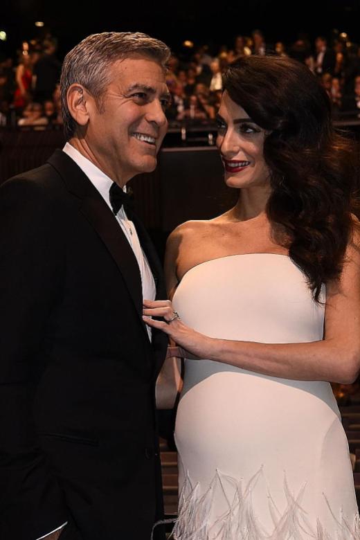Clooney vows to sue French magazine