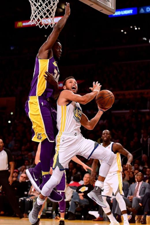 Stephen Curry lifts Golden State to over-time win against LA Lakers