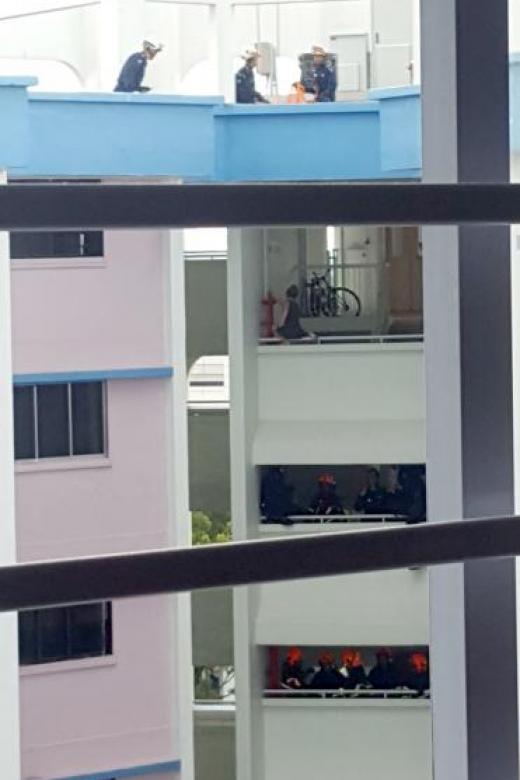 Woman on Yishun block parapet rescued after 2-hour stand-off
