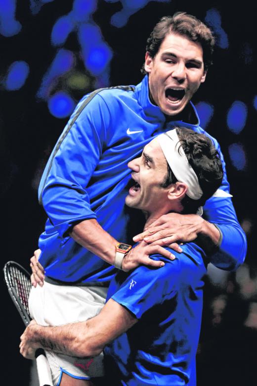 Nadal congratulates Federer after losing No. 1 spot to him
