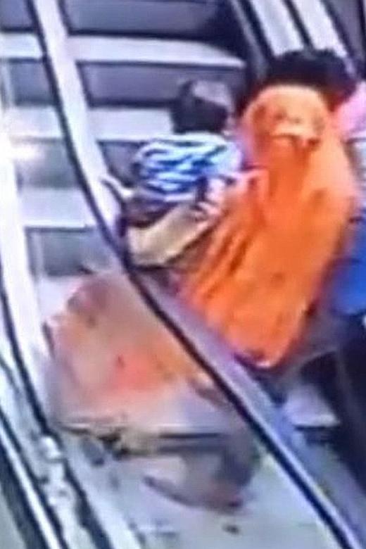 Baby falls to death from escalator as parents take selfie