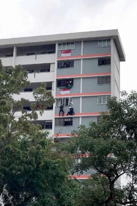 SCDF stop man from jumping, police wrest knife and arrest him