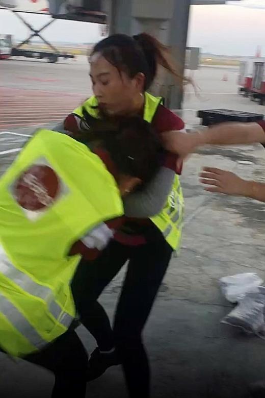 Sats staff suspended pending  probe after Changi Airport fight