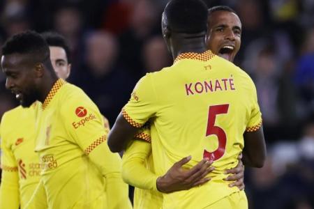 Liverpool take title race down to the wire with win at Southampton
