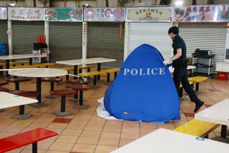 Man, 56, pronounced dead more than 12 hours after being spotted resting at hawker centre table