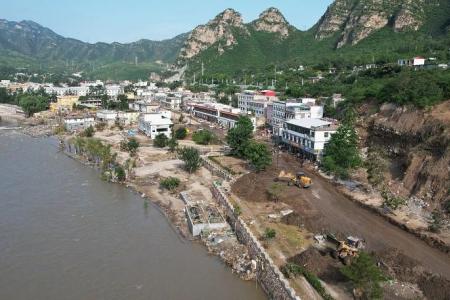 Three killed in China while trying to outrun flash flood
