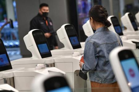 Automated clearance to be the norm for all travellers into S'pore from 2023: ICA