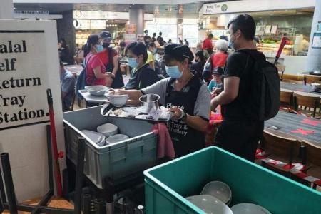 Most S’poreans return trays, because it’s socially responsible, not because of fines: Survey