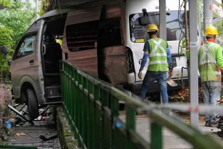 Driver taken to hospital after van crashes into covered walkway at Redhill MRT Station