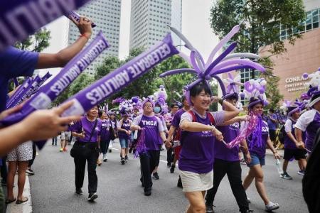 Over 13,000 people turn up at annual Purple Parade to show support for people with disabilities