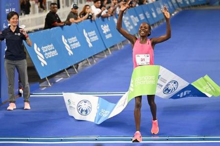 Elite runners rediscover winning feeling with StanChart Singapore Marathon titles