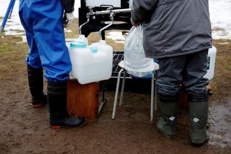 Japan quake survivors face freezing, unsanitary conditions