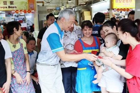 PM Lee urges S'poreans to have more kids and to do so earlier