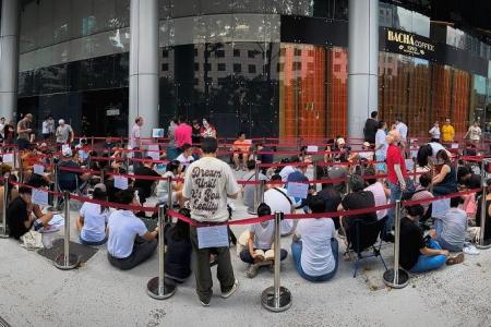 Snaking queue outside Ion Orchard on launch of Snoopy-themed MoonSwatch 