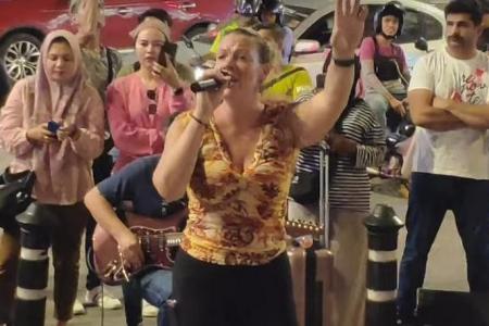 Tourist’s Zombie song whips crowd into a frenzy on Kuala Lumpur street