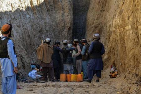 Rescuers battle to save boy trapped in Afghan well