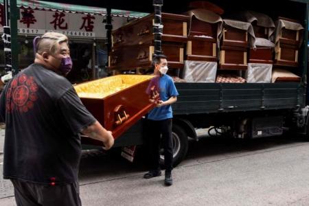 Hong Kong funeral services overwhelmed by Covid-19 deaths