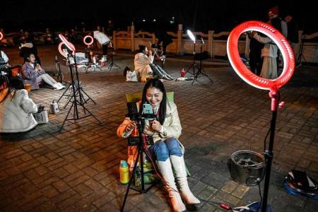 Chinese Douyin livestreamers set up stage outdoors for late-night ‘donations’