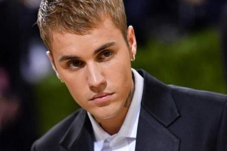Justin Bieber scraps world tour over health issues, promoters say Singapore show still on track