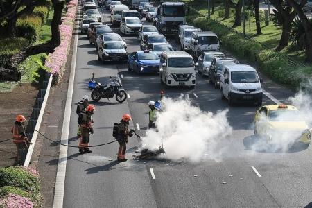 Two taken to hospital after bike catches fire in ECP accident