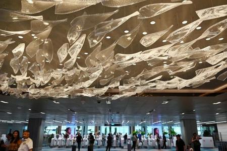 Changi Airport T2 reopens fully with 4-storey waterfall display, new garden  
