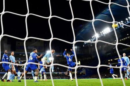 Chelsea take leap forward in 4-4 draw with Man City