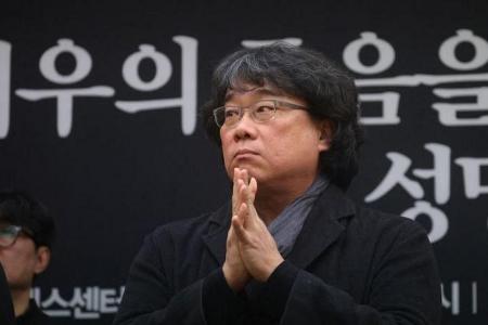 'Parasite' director, South Korean artists urge probe into handling of actor case