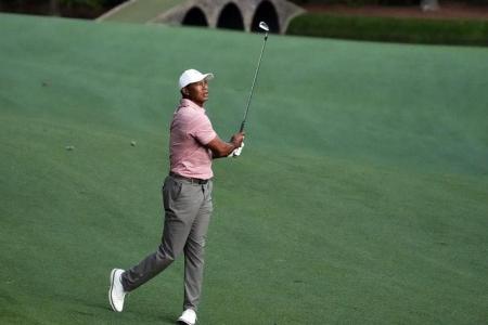Woods clears first Masters hurdle, now faces ultimate test