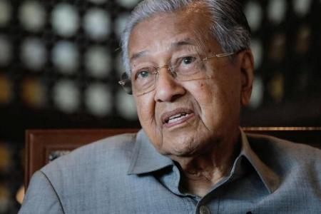 Mahathir facing anti-graft probe in case involving his sons