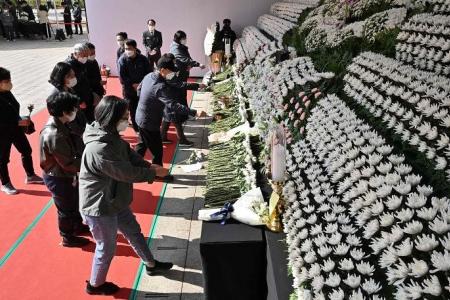Families seek missing, plan funerals after South Korean Halloween crush
