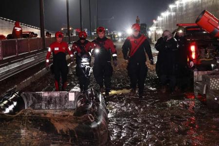 Rescuers recover last body from flooded South Korean tunnel