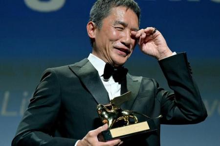 Emotional Tony Leung wins Golden Lion achievement award in Venice