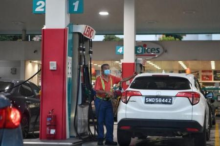 Chinese petrol firms lower pump prices to match Esso's rates