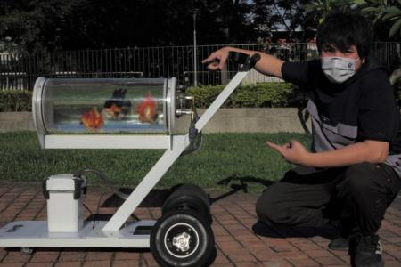 Taiwan man invents stroller for fish to 'explore other worlds'