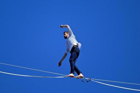 Frenchman beats high-wire record at Mont Saint-Michel