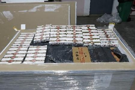 2 men arrested, over 4,600 cartons of duty-unpaid cigarettes seized by Singapore Customs
