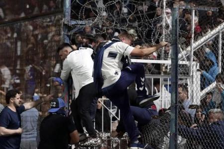 Fan dies in Argentina, match abandoned as players forced off due to tear gas