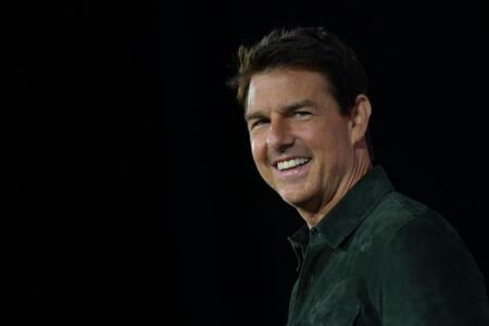 Tom Cruise unveils Top Gun sequel with mid-air stunt