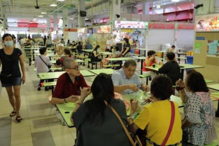 Buzz returns as hawker centres, coffee shops open to groups of 5 from different households