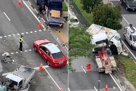 Motorcyclist killed in 7-vehicle accident in Woodlands Road; truck driver arrested