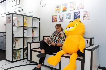 NLB launches Garfield-Mr Kiasu pop-up comic library at Centrepoint