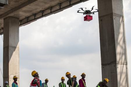 Drones used to bring smiles to foreign workers