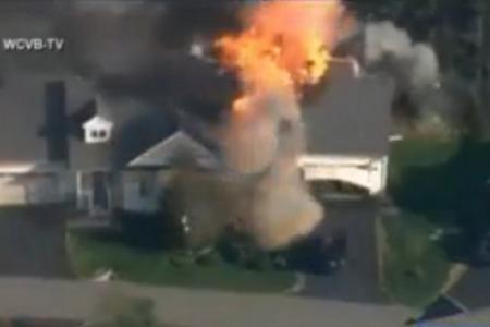 US cop shot dead, suspect's house explodes