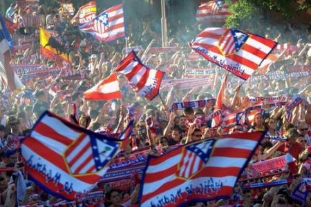 Fans of Atletico Madrid turn streets of Madrid white and red