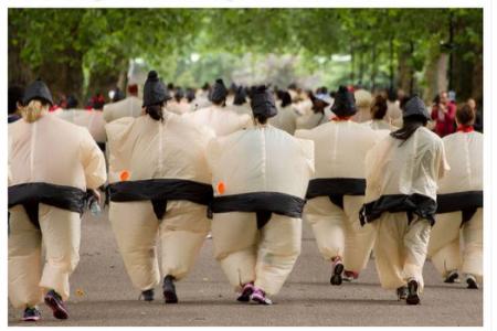 Man in sumo suit knocks himself out
