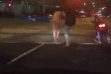 Naked man runs on the streets of Clarke Quay